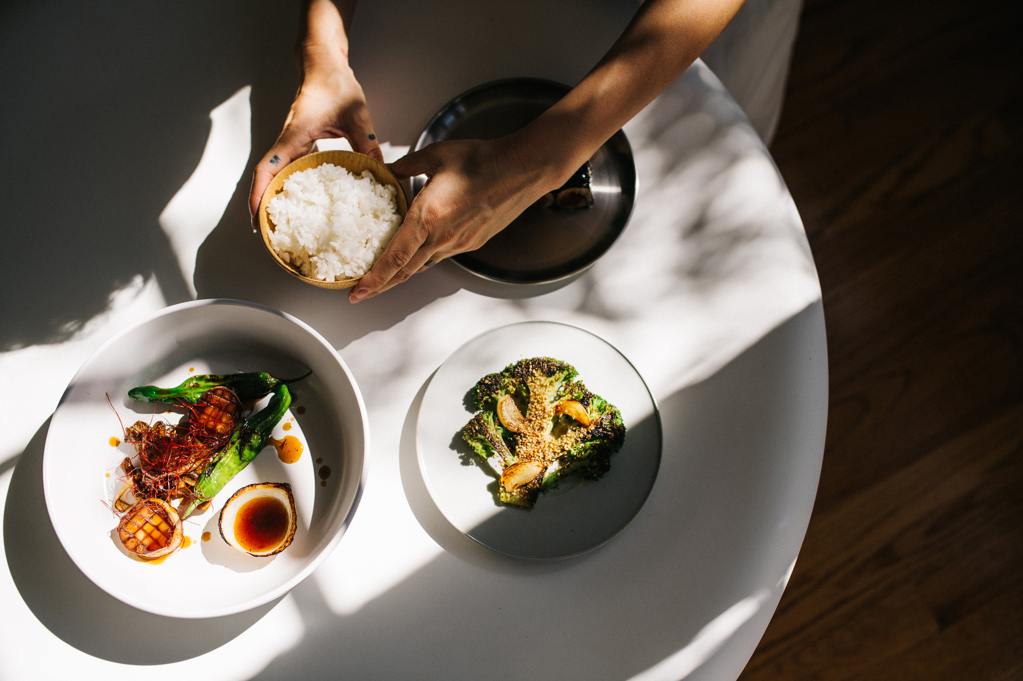 An overhead shot of Michelle Jane Lee's Korean food plated on a table.