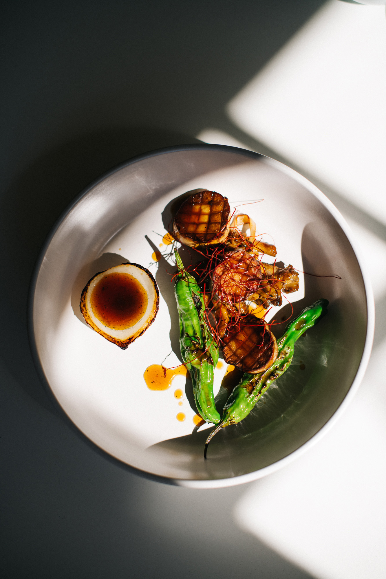 An overhead shot of Michelle Jane Lee's Korean food plated on a table.